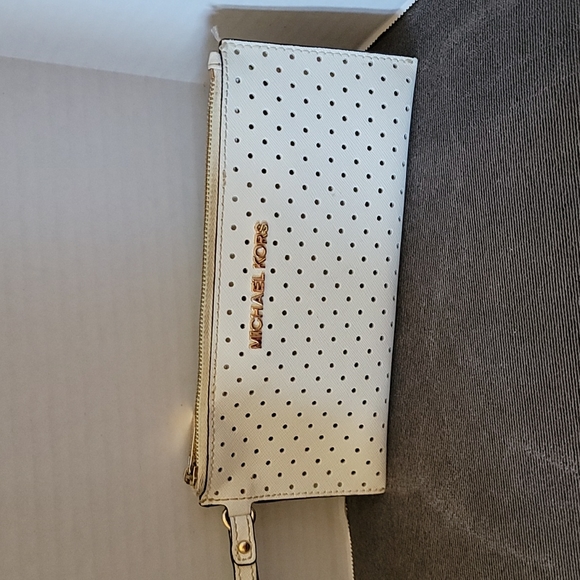 Michael Kors Handbags - Michael Kors perforated white leather zip top wristlet